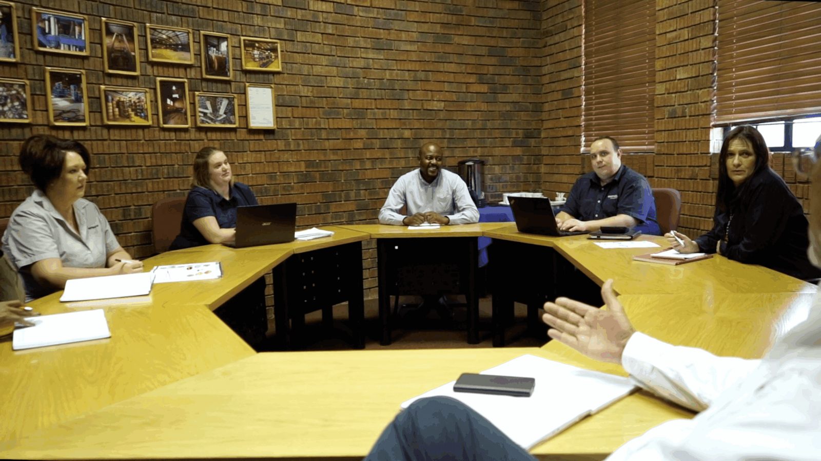 Shutterlock team meeting with clients in the boardroom