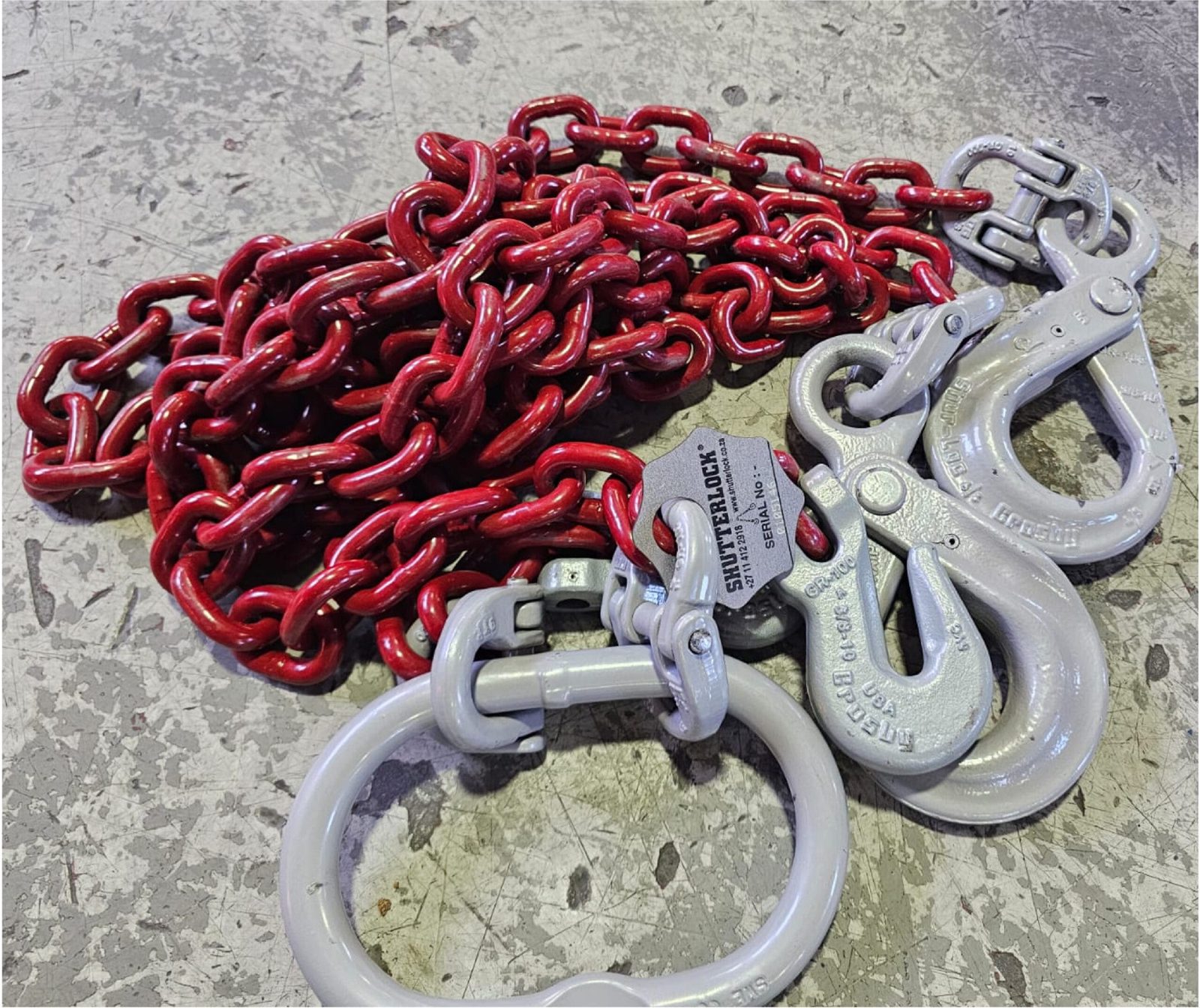 Red alloy steel chain sling with forged hooks